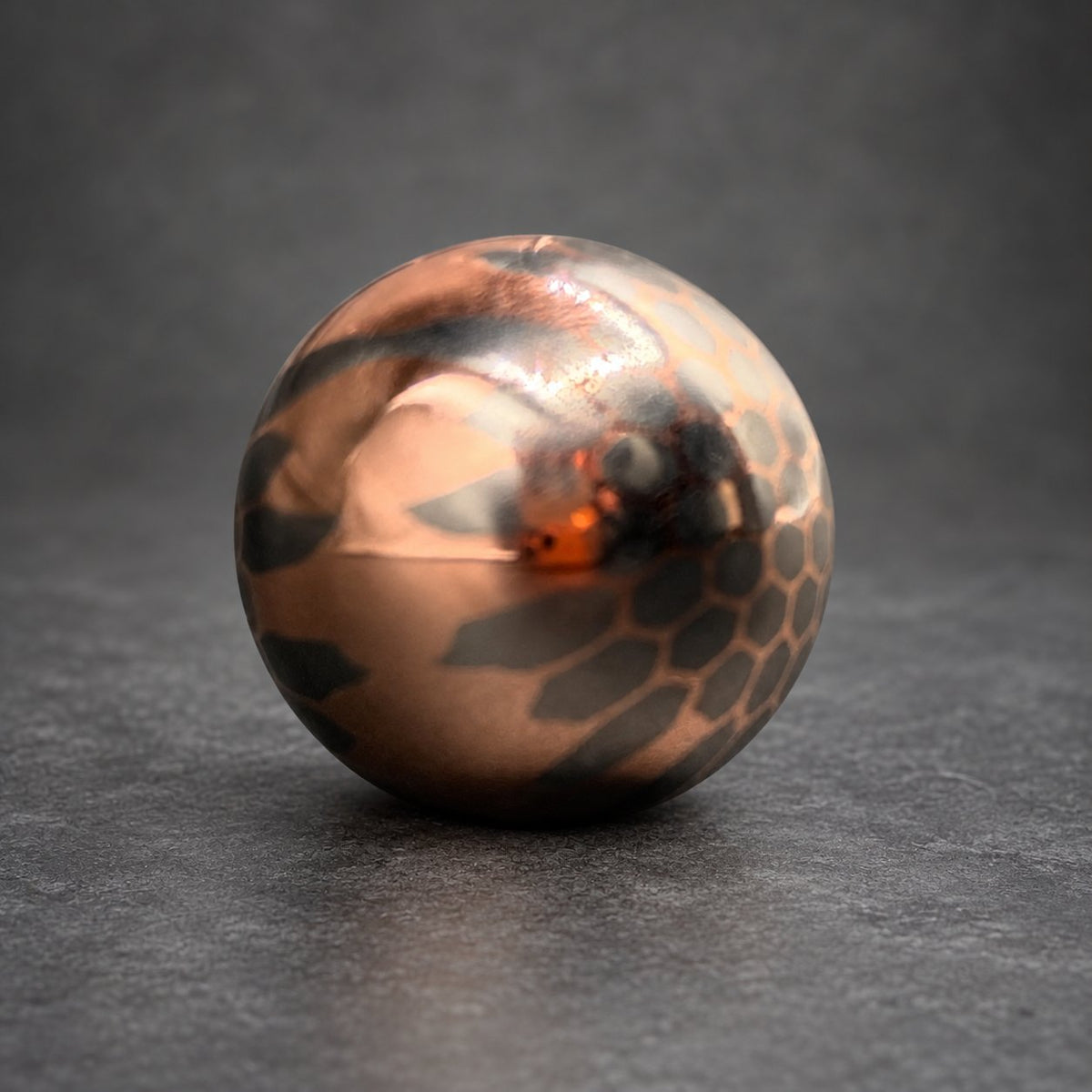 Close-up of superconductor sphere showing niobium filament bundle