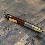 Damascus steel pen with copper clip, full length front view