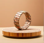 Superconductor Wedding Band — Titanium Niobium Deep Etched