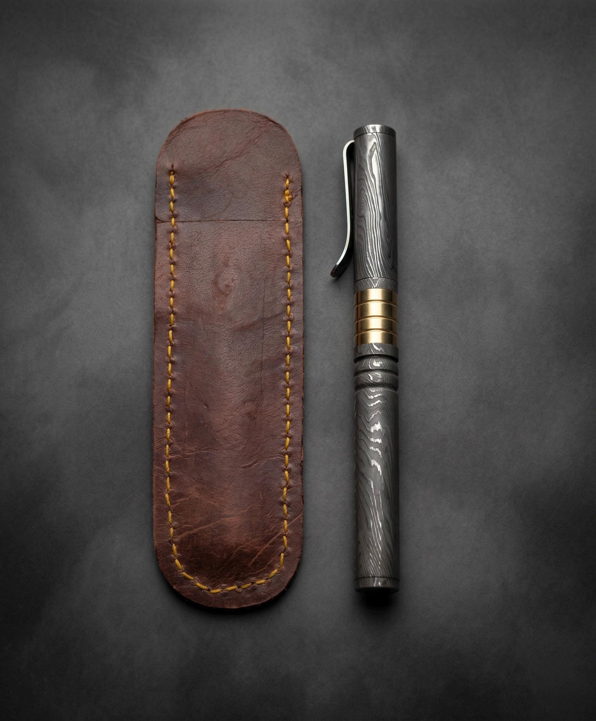 Damascus Steel Ballpoint Pen with Brass Banded Grip