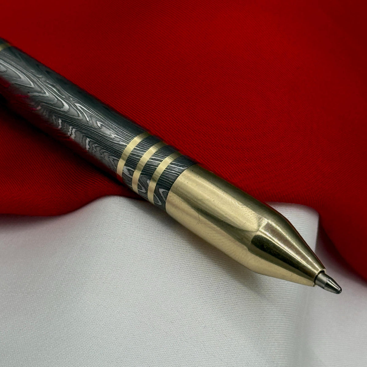 Damascus Steel Bolt Action Pen — Polished Barrel, Brass Tip