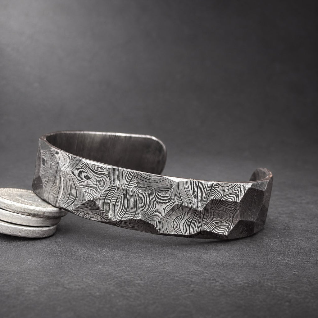 Damascus steel Viking bangle full length view, hand-forged hammered finish