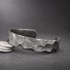 Damascus steel Viking bangle full length view, hand-forged hammered finish