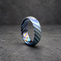 Zircoti wedding band side view, dark patterned titanium ring