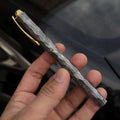 Damascus steel fountain pen with faceted barrel, hand-forged writing pen