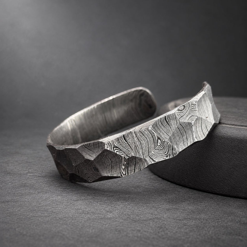 Hammered Damascus steel Viking bangle side view