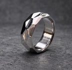 A silver ring with a faceted, geometric design. The ring is made of metal and has a brushed finish, view 8