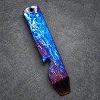 A vibrant bottle opener with a distinctive design. It displays a blue and purple lightning pattern, with a textured brown end. It has a hole for a keyring.