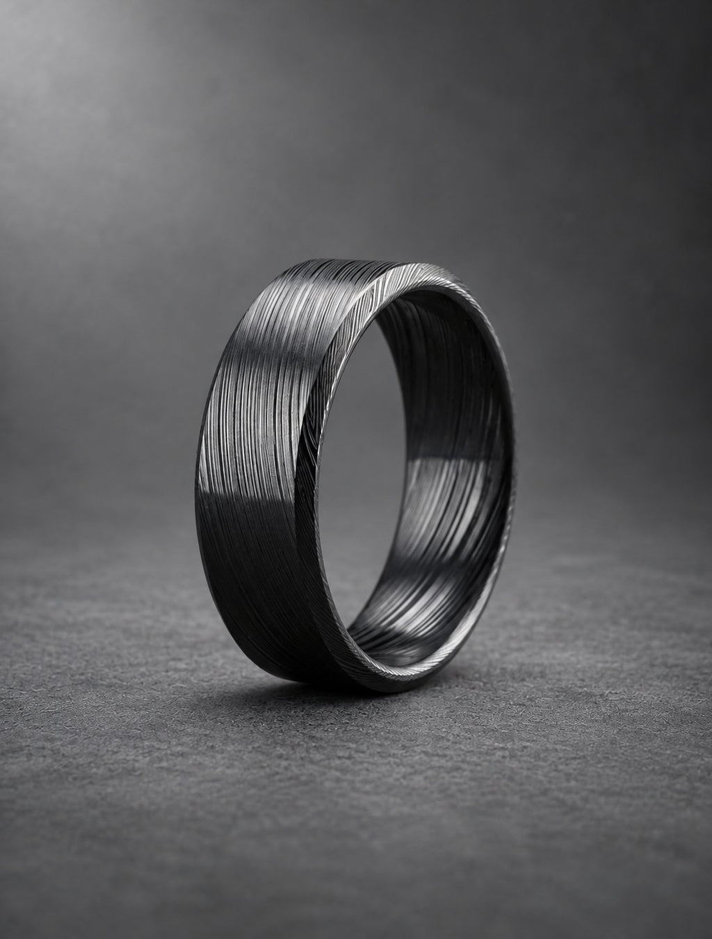 Black beveled Damasteel band, side view