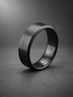 Black beveled Damasteel band, three-quarter view